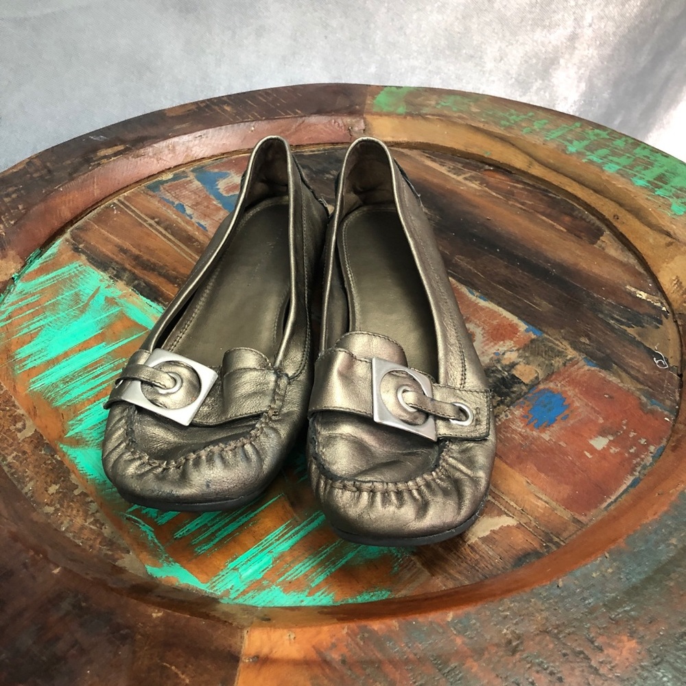 Bronze moccasins with silver buckle detail